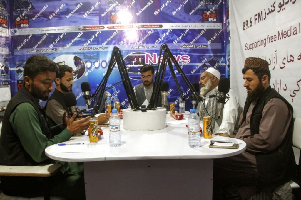Radio discussion about the importance of media for the development of society